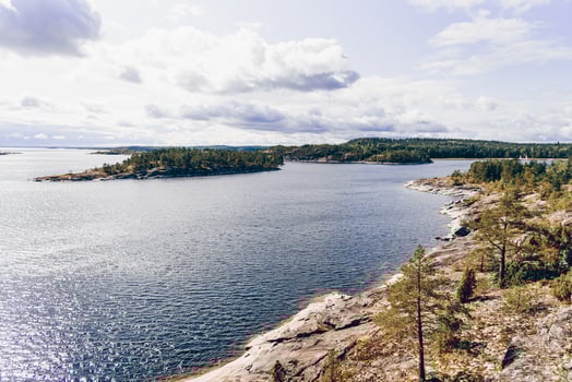 Landscape blue deep nice lake light sun, clouds sky mountains Ladoga skerries Karelia photo