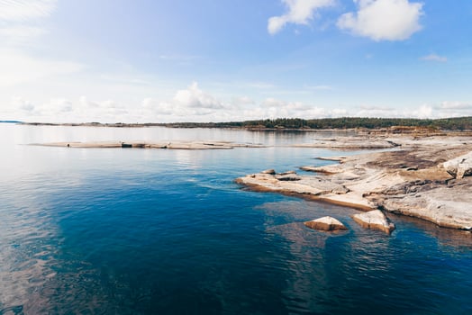 Landscape blue deep lake light sun, clouds sky handsome mountains Ladoga skerries Karelia photo