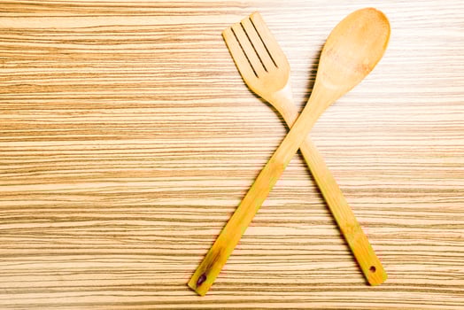 kitchenware on wooden background photo