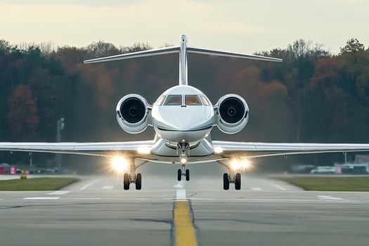 Private jet taxiing on runway at sunset, luxury travel concept photo
