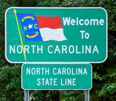 North Caroline, USA, 2025 - Welcome to North Caroline State Road Side Sign on Highway photo