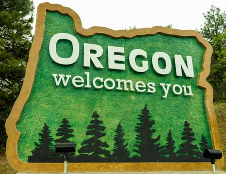 Oregon, USA, 2025 - Welcome to Oregon State Road Side Sign on Highway photo