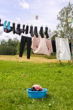 Colorful laundry on the rope outdoors photo