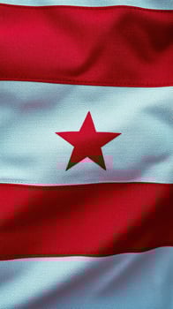 District of Columbia flag waving in the wind showcasing red and white stripes with a bold star photo