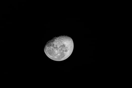 Half-moon on a black background photo