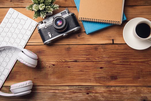 earphone with keyboard and notepad with camera photo