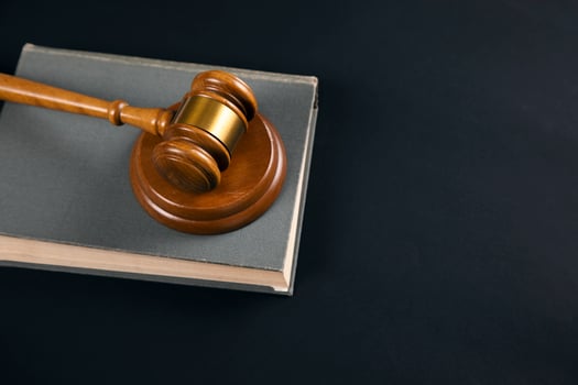 Judge gavel with books on the table photo