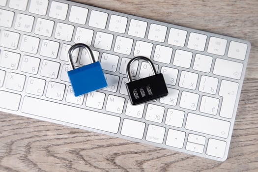 Two padlock on a keyboard photo