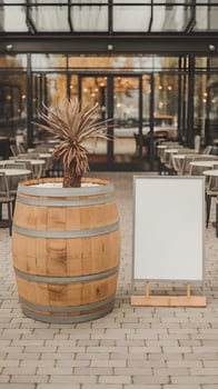 Wooden Barrel with Plant Barrel and blank signboard near outdoor cafe seating area Vertical Mobile Wallpaper photo