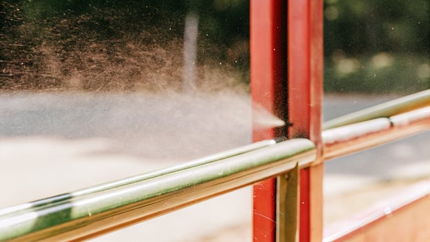 Macro shot of dust particles on a city bus stop photo