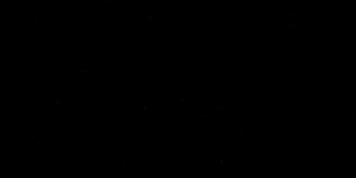 Starry night sky with countless twinkling stars in pitch black space photo