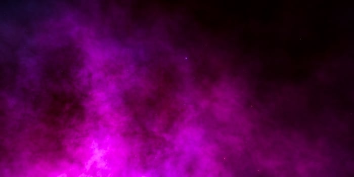 Vibrant pink nebula in space showcasing cosmic mystery and beauty photo