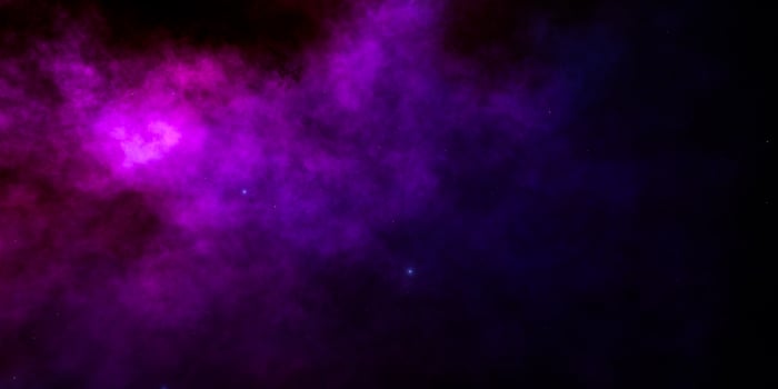 Vibrant purple nebula with stars in cosmic space photo