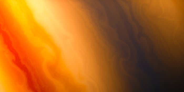 Vibrant abstract gradient with warm tones and flowing swirls photo