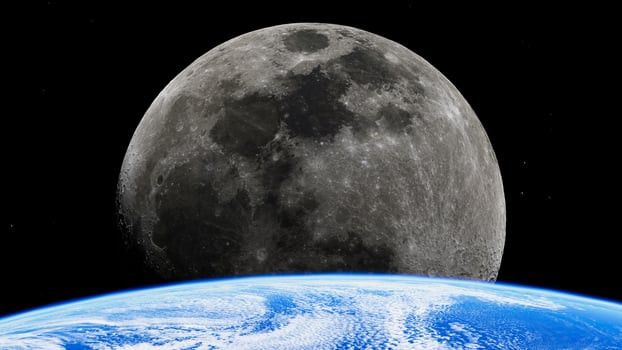 Majestic view of the moon above the earth's atmosphere in space photo