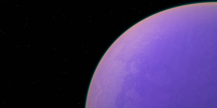 Violet planet against a starry night sky photo
