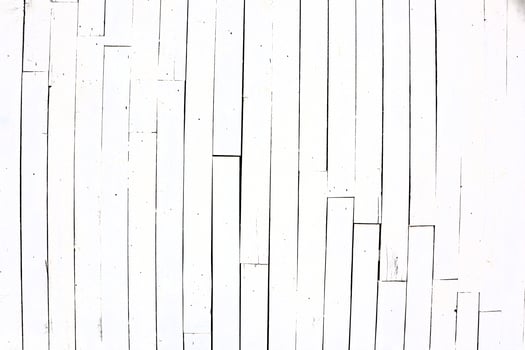 Here is a beautifully textured background featuring white wooden planks, ideal for design projects photo