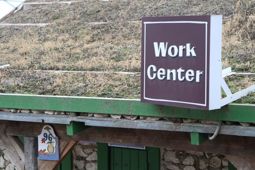 A beautifully designed Work Center Building featuring a Green Roof and effective Signage photo