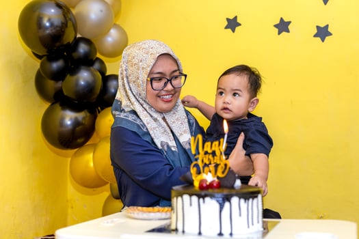 Mother and Baby Celebrating a Special First Birthday photo