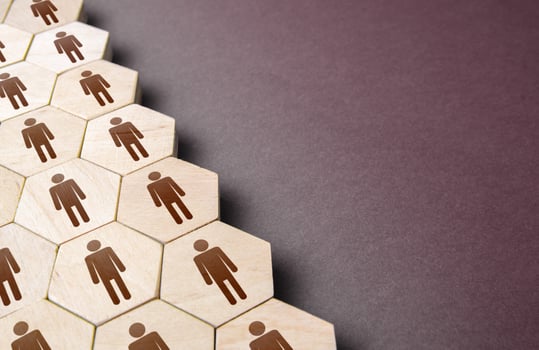 Hexagons with people in a structural order. Formation of company personnel, staffing. Hiring new employees and recruiting staff. Personnel management. Unity. Team discipline, teamwork cooperation. photo