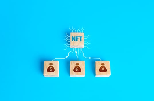 Blocks NFT non-fungible token and money connected by lines. Selling digital assets and art through auctions. Blockchain technology. Monetization, investment in cryptographic tokens, cryptocurrency. photo