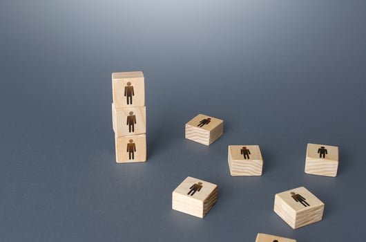 Figurine block tower with people. Hierarchical system. Company organization. Hiring, recruiting. Effective productive business employees group collectives. Team building personnel leadership. photo