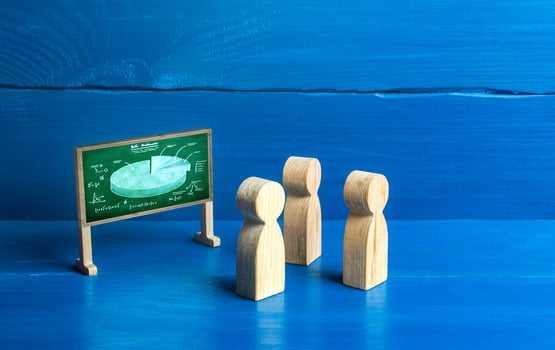 Figures of people are looking at the blackboard with a diagram. Briefing and work meetup. Training and coaching. Statistics analysis and marketing strategy development. Data review, market share photo