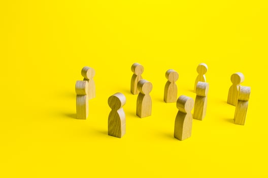 Figures of people stand randomly on a yellow background. People society concept. Behavior and social science relationships. Human resources. Personnel Management. Large group crowd photo