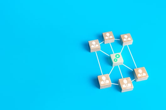 Blocks of people connected by connections unite around work on a new project. Founding a business company around a startup development. Cooperation teamwork. Innovation, collective fresh ideas. photo