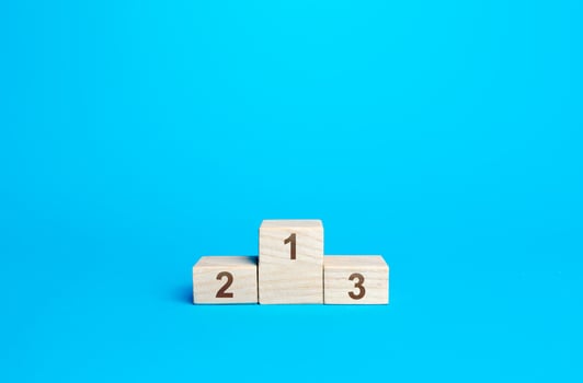 Sports podium awards on a blue background. First second and third place. Competition and concept. Summing up the results of contest. Empty prize places, canceled competitions. photo