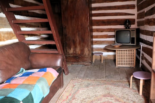A Rustic Cabin Interior with Vintage Decor, creating a warm and nostalgic ambiance photo
