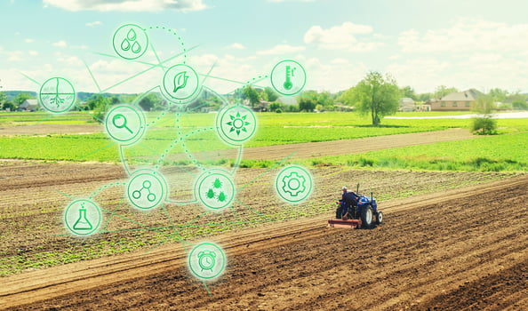 Futuristic innovative technology pictogram and a farmer on a tractor. Science of agronomy. Farming and agriculture startups. Improving efficiency. Technology Improvement in quality and yield growth. photo