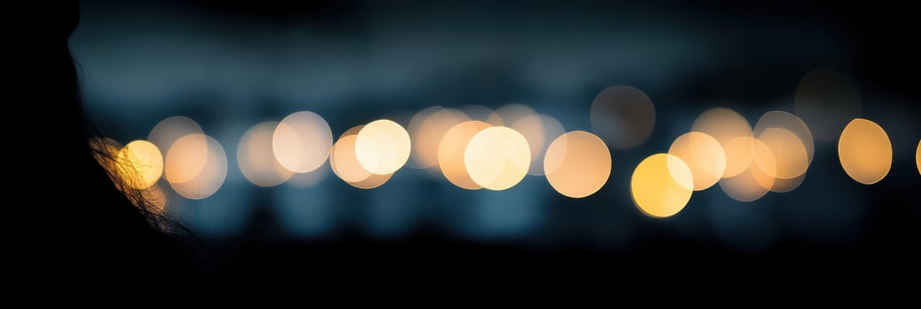 Abstract bokeh lights blurred city background of circular defocused urban scene photo