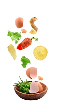 Falling food waste in plate on white backgrounds. photo