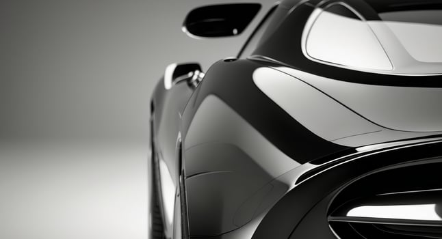 A close up of the rear end of a black car photo