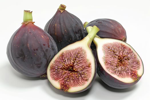 Fresh figs showing ripe interior on white background photo