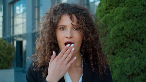 Shocked surprised amazed Caucasian woman businesswoman manager female student lady business portrait girl open mouth shock wonder wow stunned reaction amaze astonish unexpected news in city outside photo