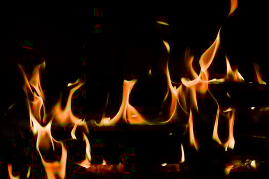 Red blaze Fire flame on a black background photo