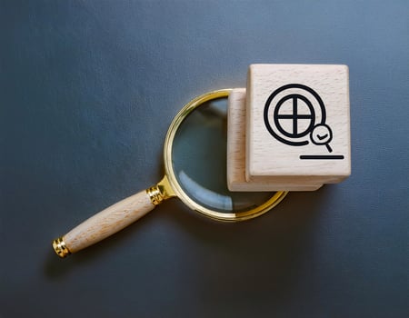 Internet Search Concept Wooden Blocks, Internet Icon, and Magnifying Glass photo