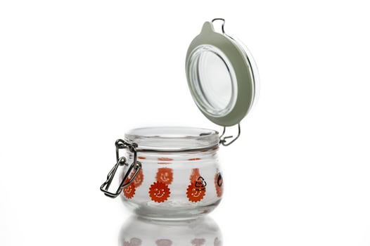 Colorful glass jar with a floral design showcasing vintage and artistic flair for home decor photo