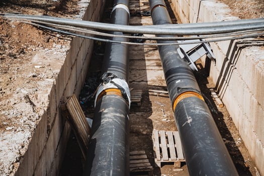 Pipeline installation in trench using steel casing pipes for gas transport photo