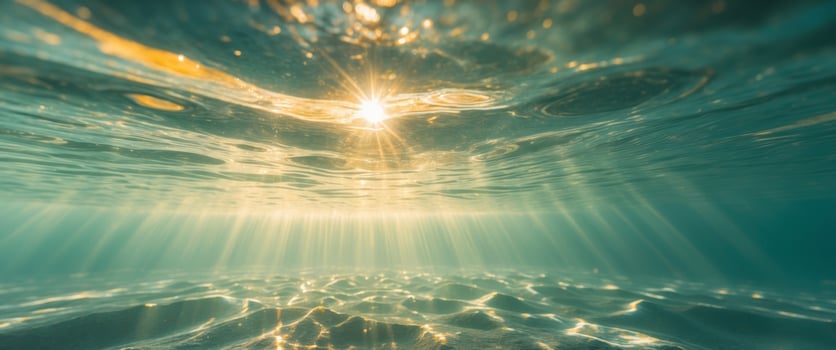 Underwater Scene with Sunlight Streaming Through Crystal Clear Water Surface Background. photo