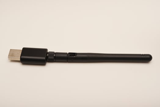 USB Bluetooth Adapter for PC. Wi-Fi router on a white background. photo