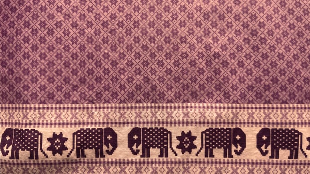 A purple fabric with elephants on it.37 photo