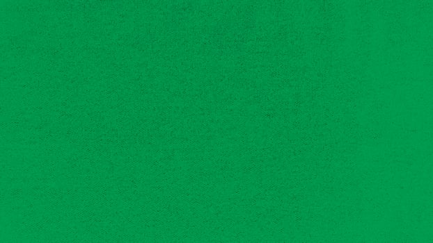 A deep green fabric with a pattern photo
