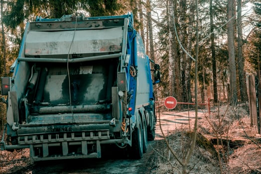 Municipal public transport of cleaning service stopped on road photo