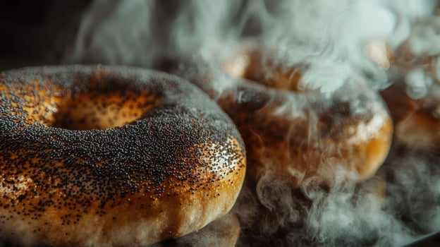 A close up of bagels with smoke coming out of them photo