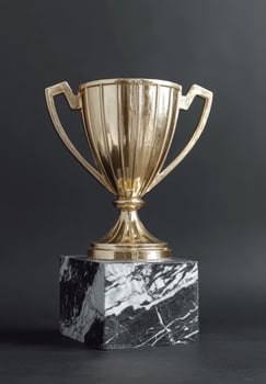 Gold trophy on marble base photo