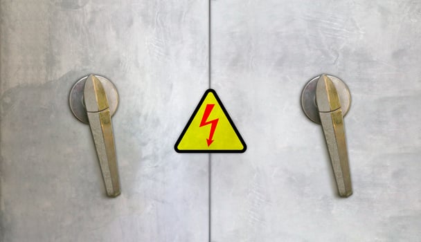 Knob on Electrical control cabinet, Knob on grunge metal door background photo