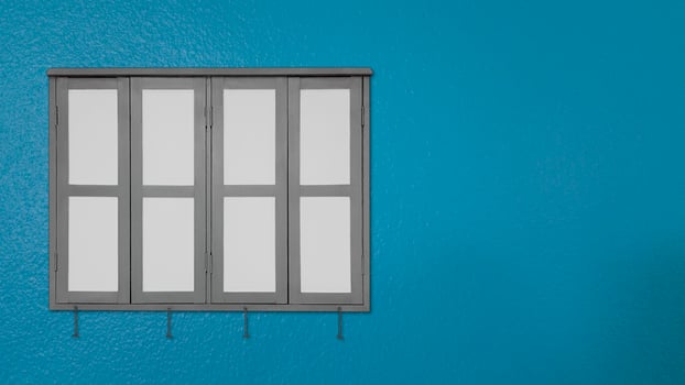Window on blue walls photo